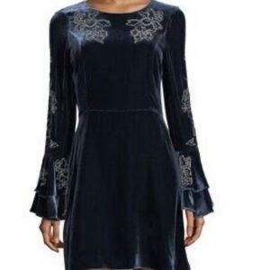 Velvet dress with beaded sleeves